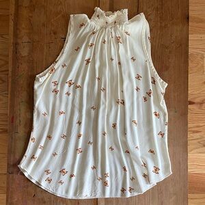 Chic Sleeveless Blouse with Delicate Brown butterfly Accents